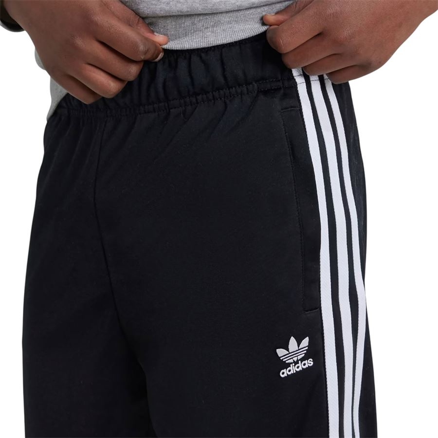 Track pants adicolor SST Junior pantaloni tuta da bambino Adidas | IX7630X